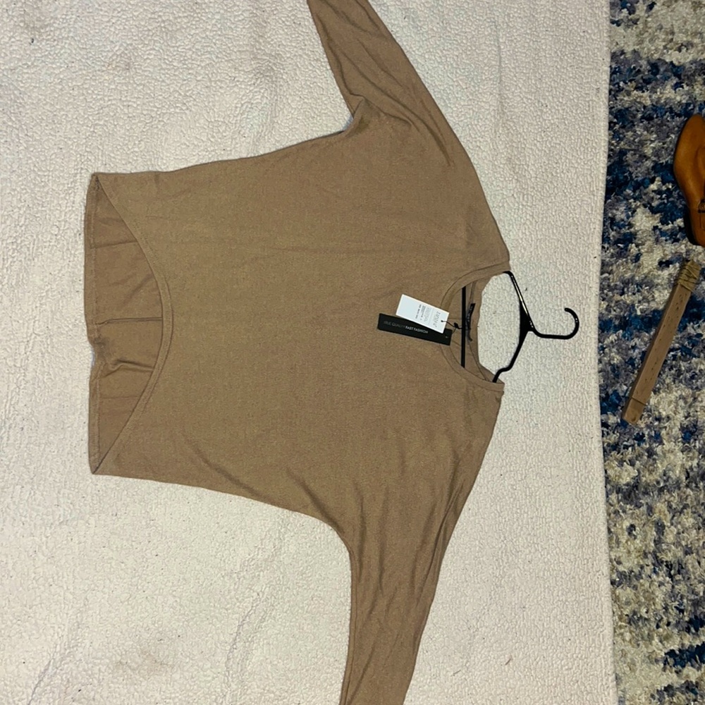 Made of 95% polyester and 5% spandex, never worn.